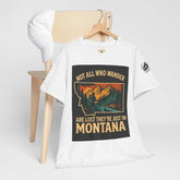 Get Lost in Montana Tee on hanger with vibrant nature print, perfect for adventure seekers.