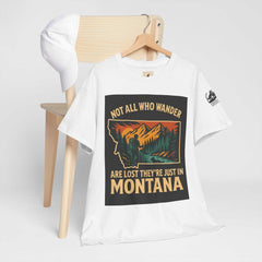 Get Lost in Montana Tee on hanger with vibrant nature print, perfect for adventure seekers.