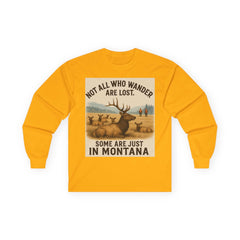 Montana Wanderlust Long Sleeve Tee in gold, with "Not all who wander are lost. Some are just in Montana" print.