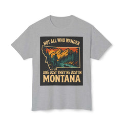 Montana Adventure Tee with nature-inspired print and quote, made of softstyle fabric for outdoor enthusiasts.
