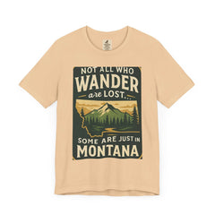 Scenic outdoor adventure shirt with Montana graphic and "Not all who wander are lost" quote.