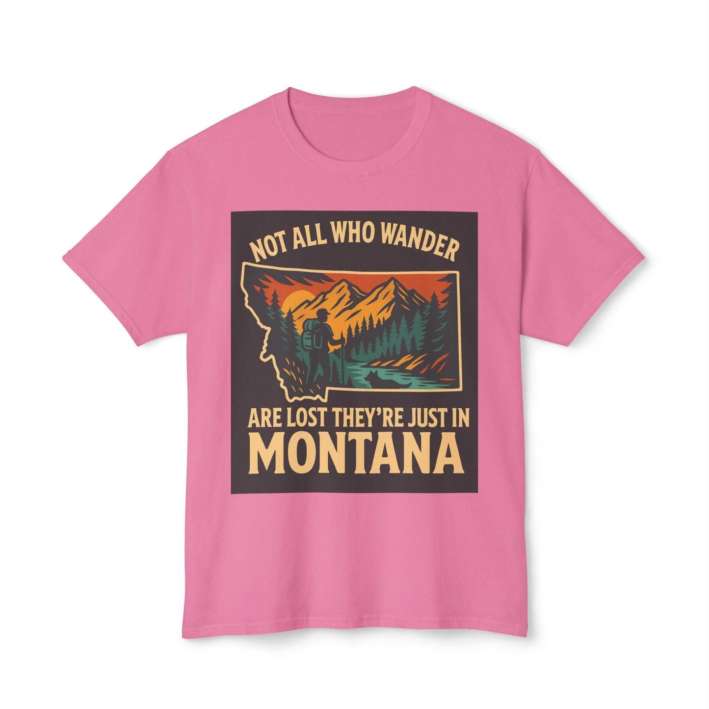 Pink Montana Adventure Tee with nature-themed graphic and "Not All Who Wander Are Lost They're Just in Montana" slogan.