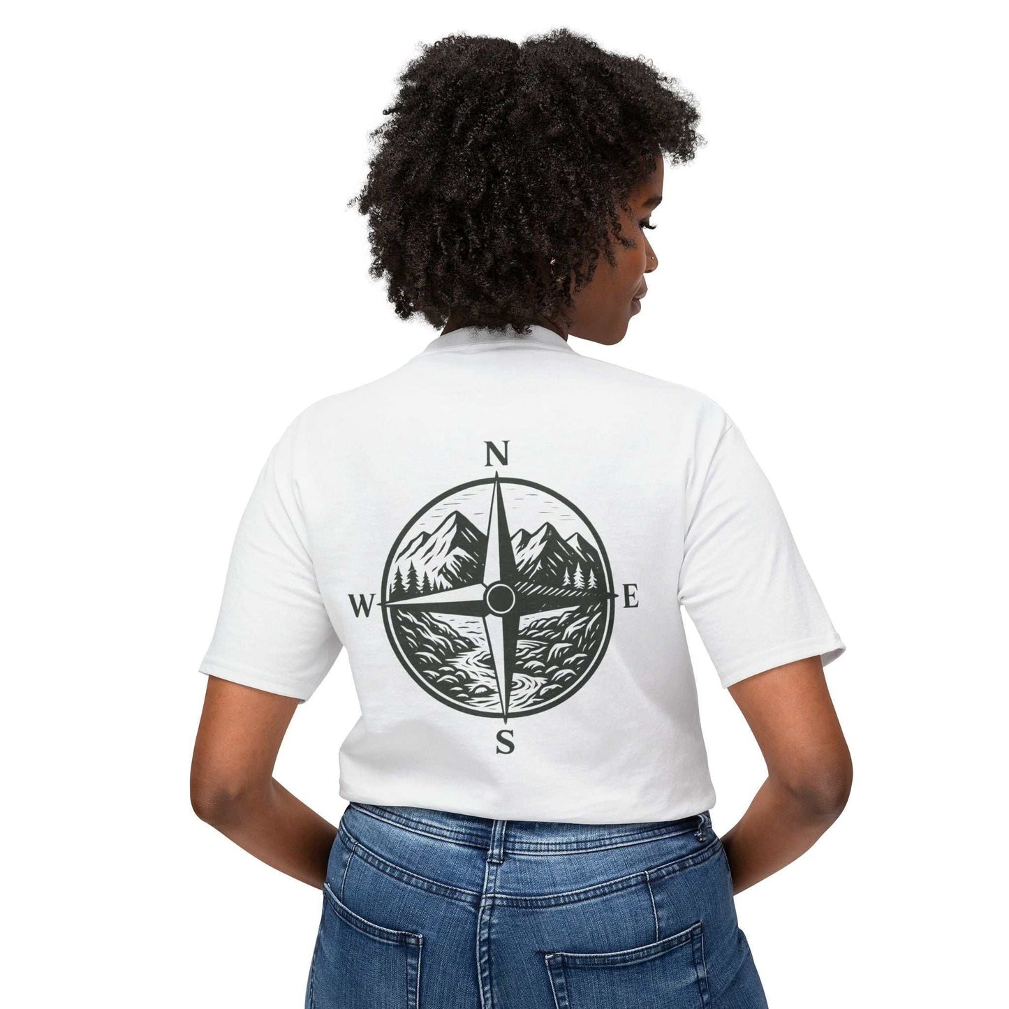Woman wearing Montana Adventure Tee with compass and mountain design on back, symbolizing outdoor exploration and freedom.