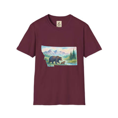 Montana Adventure Tee with vintage bear graphic in front of mountains and trees, perfect for nature lovers.