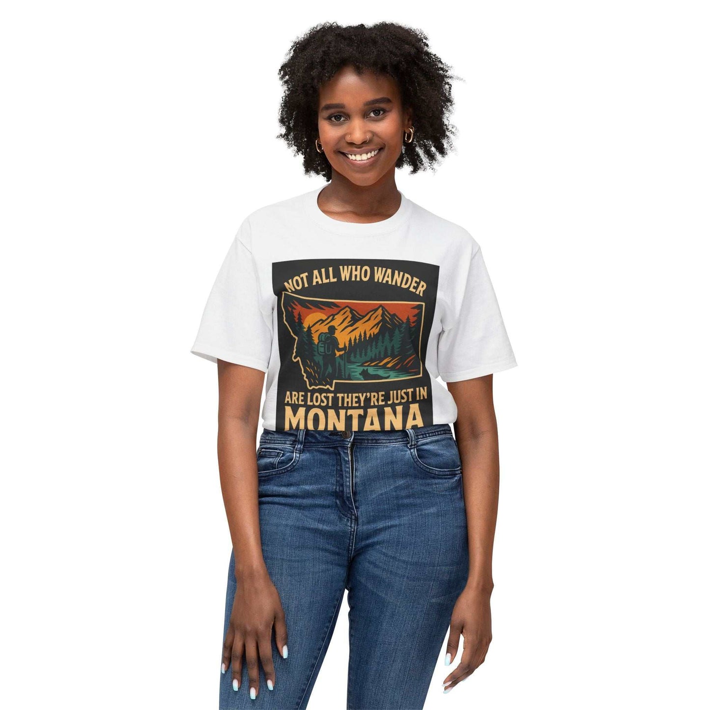 Montana Adventure Tee with nature-themed design worn by a smiling person.