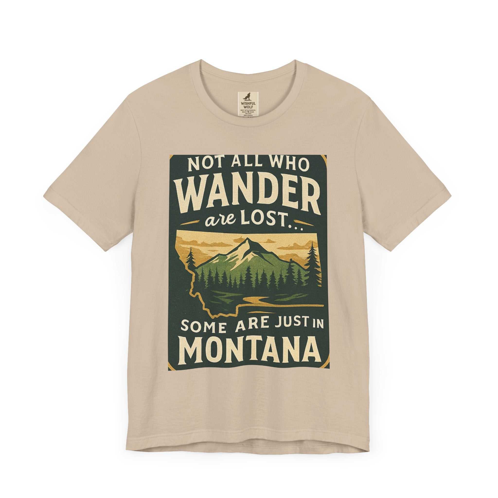 Beige "Get Lost in Montana Tee" with scenic graphic and quote for outdoor enthusiasts.