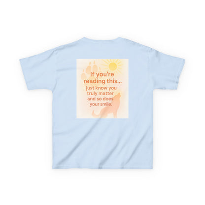 Nature-inspired Montana Adventure Kids Tee with positive message on soft blue fabric, designed for comfort and movement.
