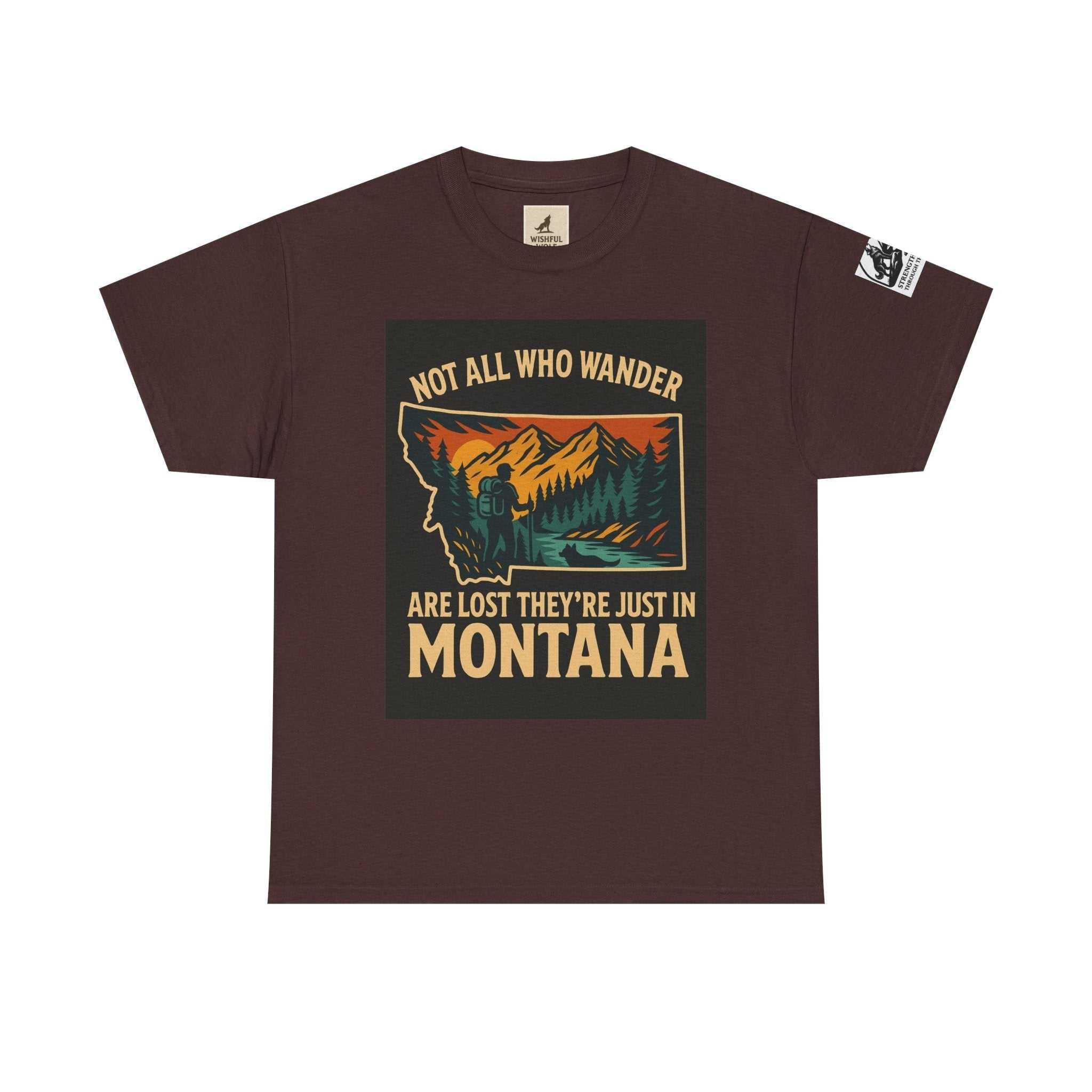 Get Lost in Montana Tee featuring a vibrant nature print with a hiker surrounded by mountains and trees, promoting outdoor adventure.