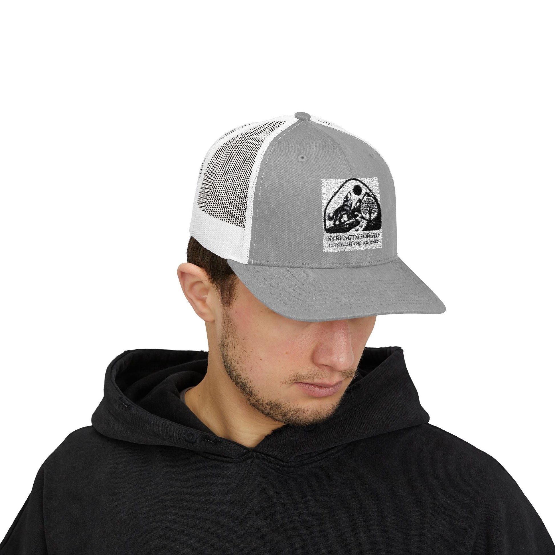 Forged in Kindness Hat – Strength Trucker Cap with Bold Message