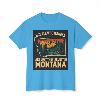 Montana Adventure Tee with nature-themed design and "Not All Who Wander Are Lost, They're Just in Montana" slogan, softstyle fabric.