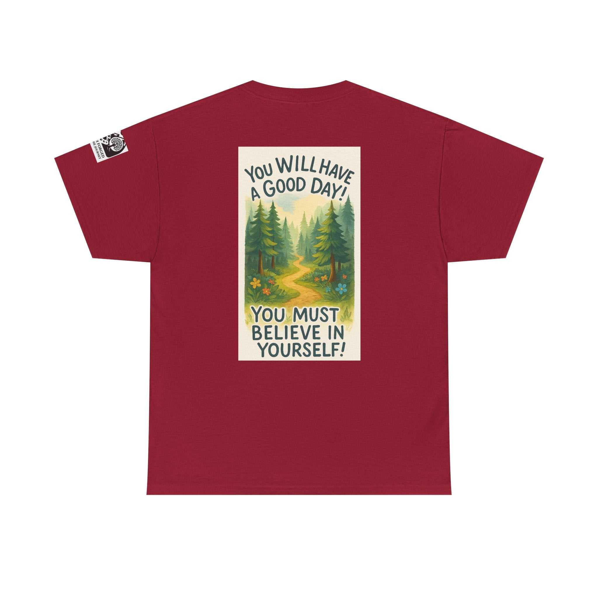 Red "Get Lost in Montana Tee" featuring an inspirational nature print with pine trees and trail, promoting adventure and self-belief.