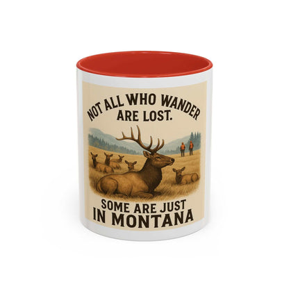 Montana Adventure Mug with elk design and red interior, featuring "Not All Who Wander Are Lost" quote.