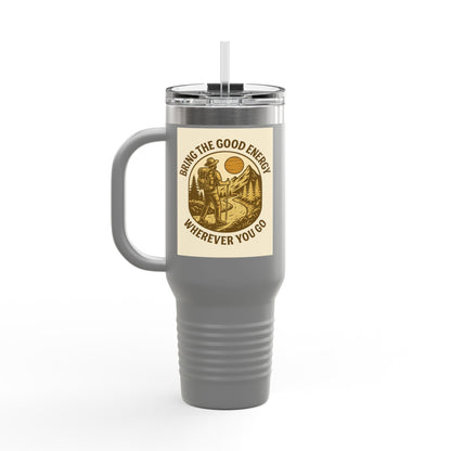 40oz insulated travel cup with positive design and ergonomic handle, featuring "Bring the Good Energy Wherever You Go" message.