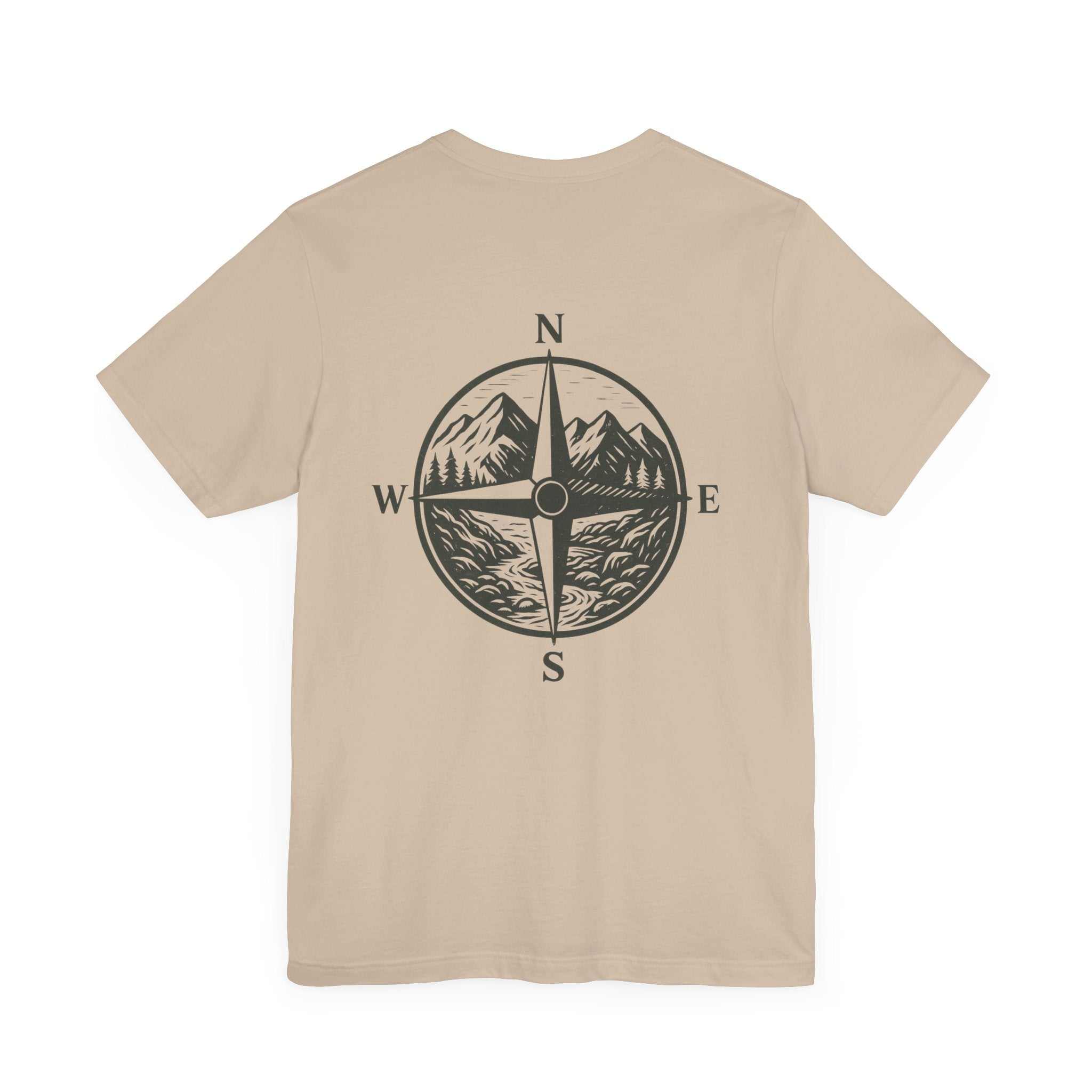 Scenic design on the back of the Get Lost in Montana Tee, featuring a compass with mountain and nature elements.
