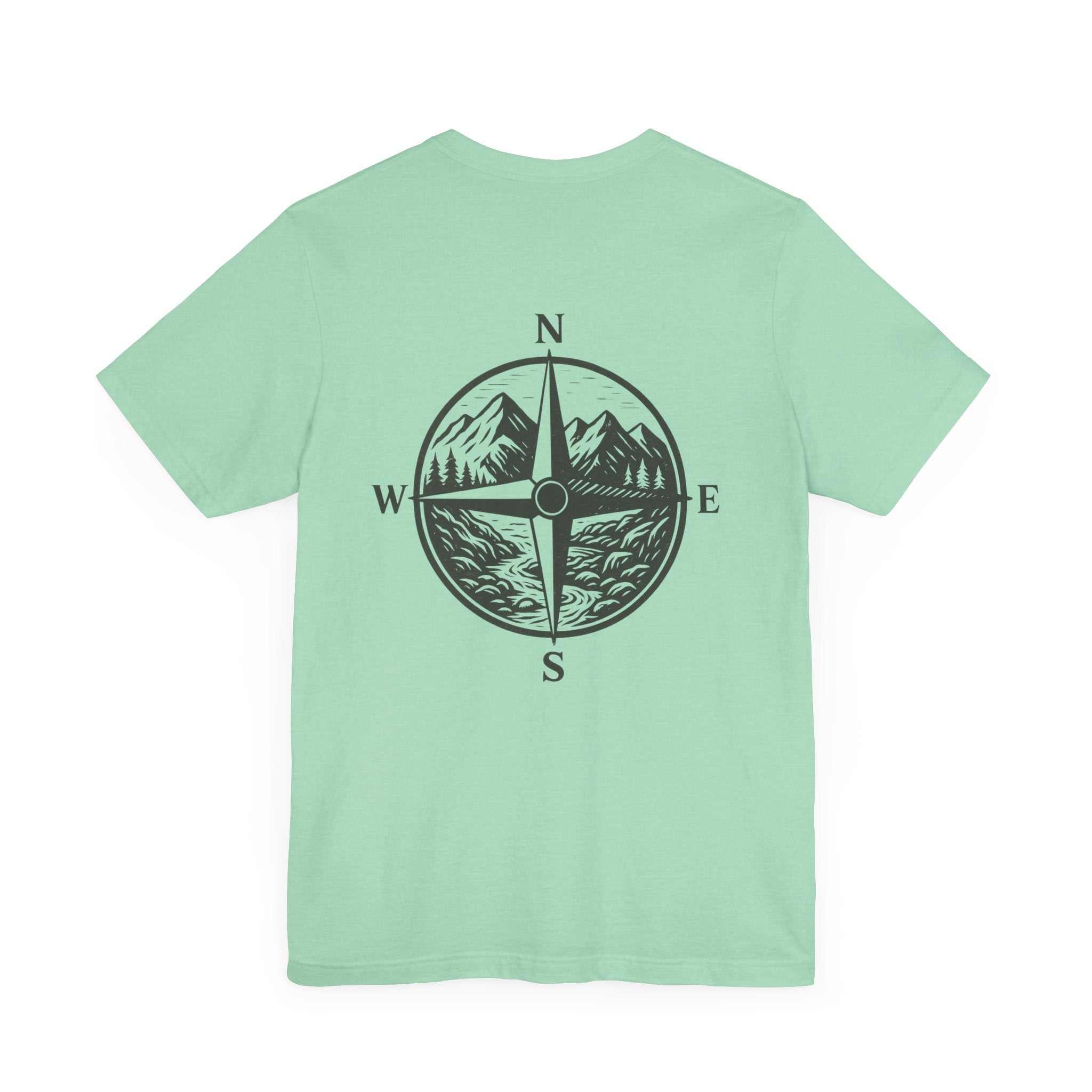 Scenic outdoor adventure "Get Lost in Montana Tee" with mountain compass graphic, ideal for explorers.