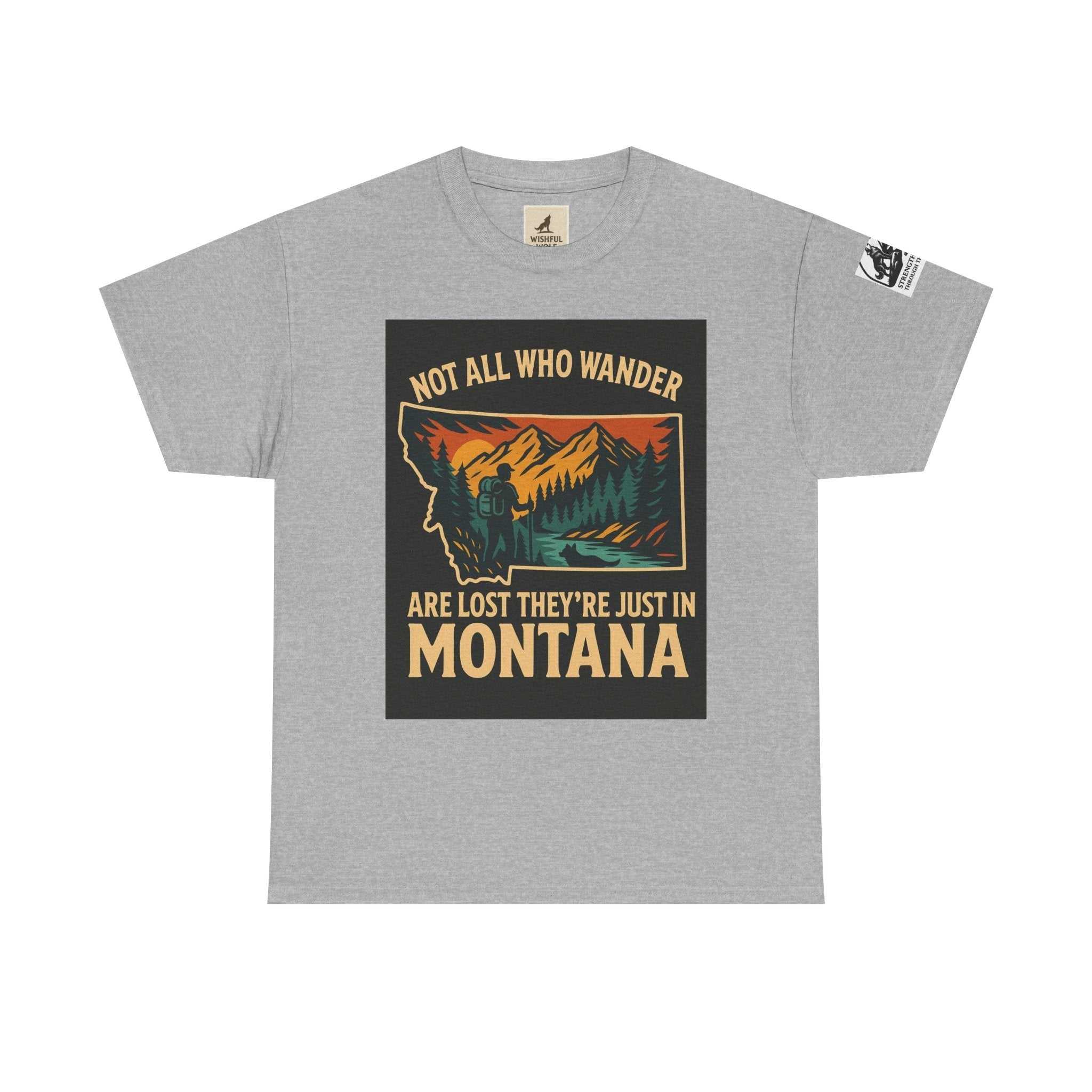 Soft grey "Get Lost in Montana Tee" with vibrant outdoor-themed print featuring a hiker and nature; ideal for adventure seekers.