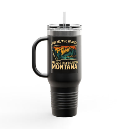 Large black insulated Montana Adventure Mug with ergonomic handle and lid, featuring a nature-inspired design.
