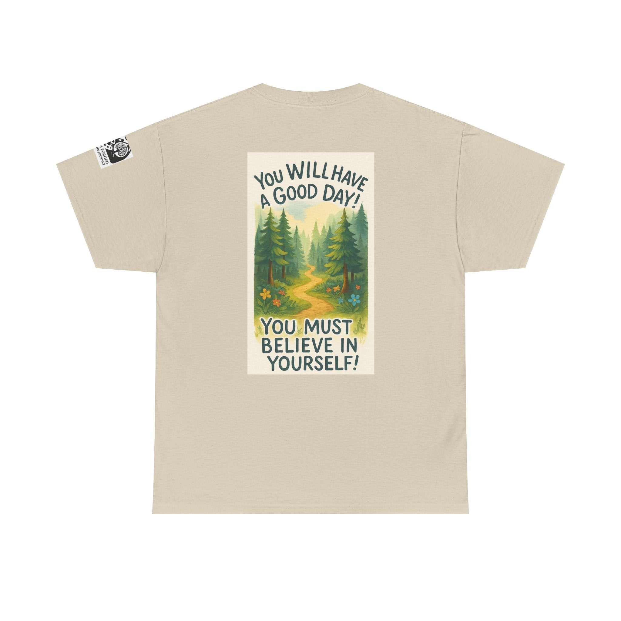 Soft beige adventure tee with vibrant nature print; "You Will Have A Good Day! You Must Believe in Yourself!" text; Get Lost in Montana Tee.