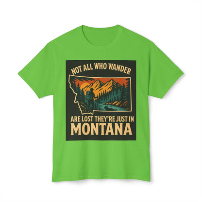 Montana Adventure Tee with nature-inspired design, featuring mountains and forest, on a vibrant green shirt.
